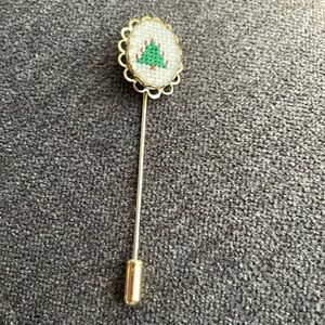 Vintage crossstitch lapel pin/stick pin.Hard to find.Gold tone w/ Christmas tree